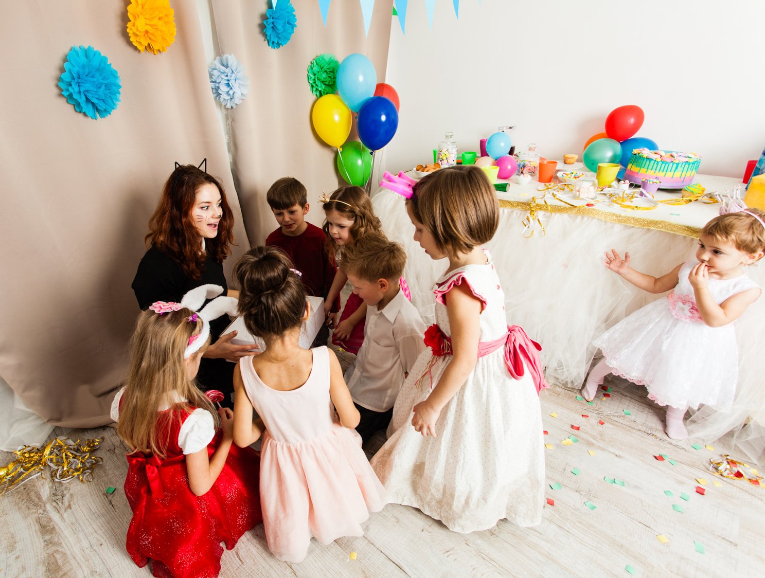 Woman in Cat Costume Entertaining Kids