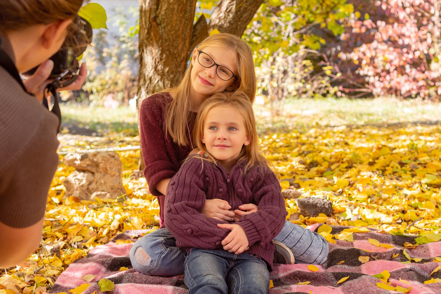 woman photographs her children